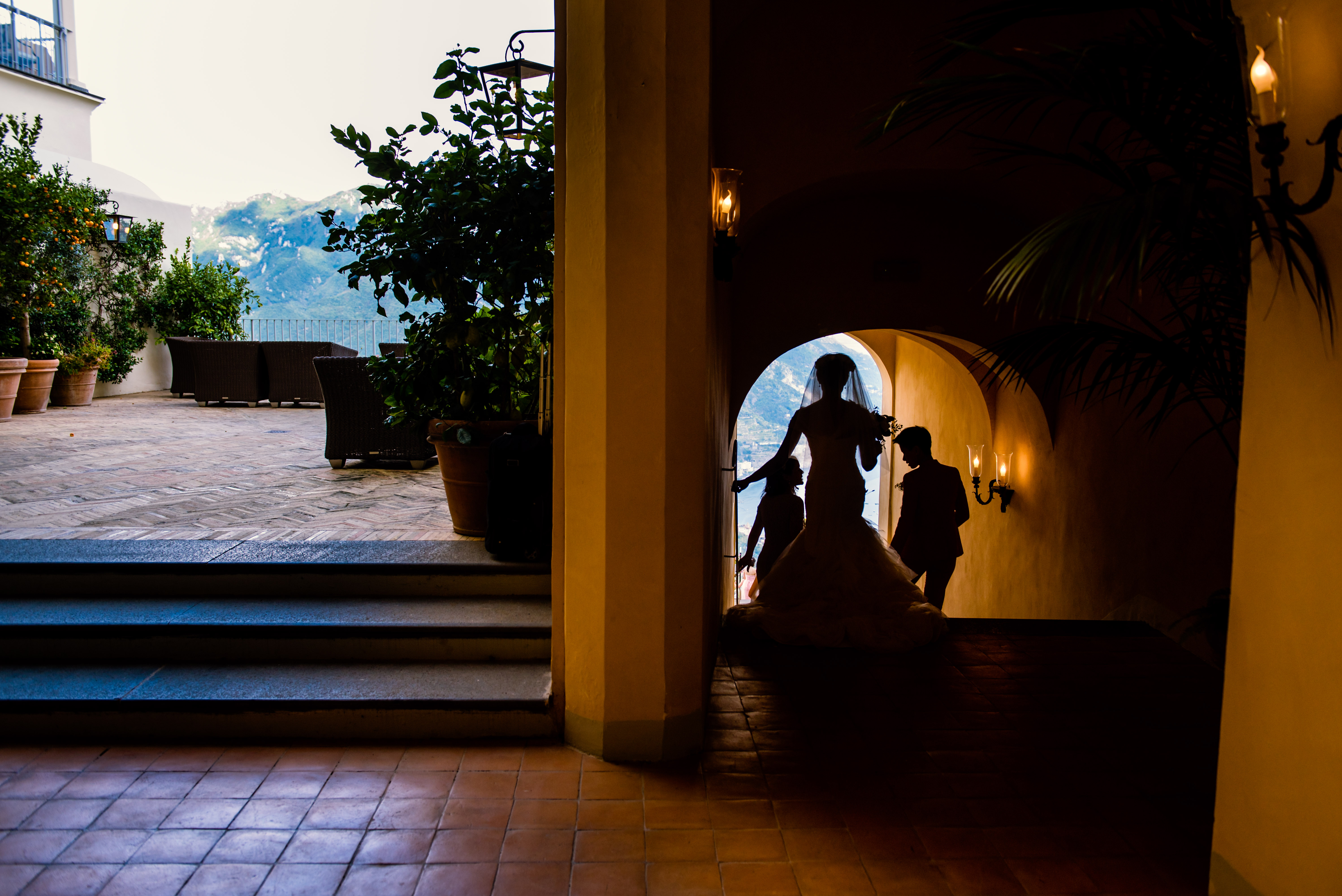 Belmond Hotel Caruzso Weding bride walking down stairs
